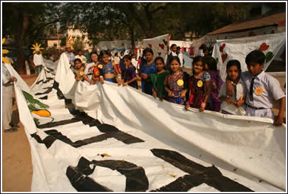 Students display the huge banners at Gandhi Ashram 