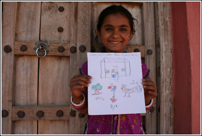 Kutchy girl holds her letter of friendship.