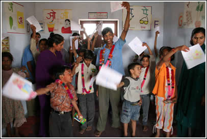 A happy classroom show off their friendship letters.