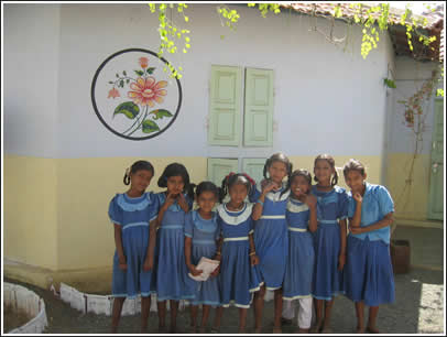 Girls pose at a school in Ratanpur on Khadir Island near Dolovira, Kutch.