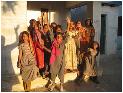 Kids from a small town called Tuga in Kutch. Kids always have a lot of fun when the Friends Without Borders team rolls through. :) 