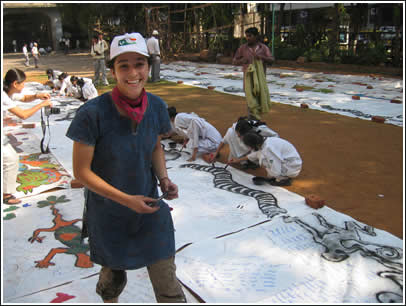 Our Big Letter captain, Maria, oversees work on the border pieces as Yoo-Mi snaps a shot.