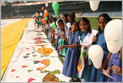 Students prepare for the balloon launch - sending messages of friendship up into the air with their names and school addresses on the backs. 